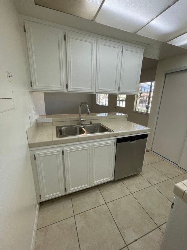 Building Photo - Beautifully Renovated Marina Village Condo...