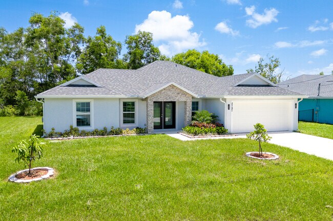 Building Photo - 5797 NW Coosa Dr