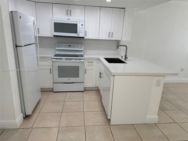 Building Photo - 8695 NW 6th Ln