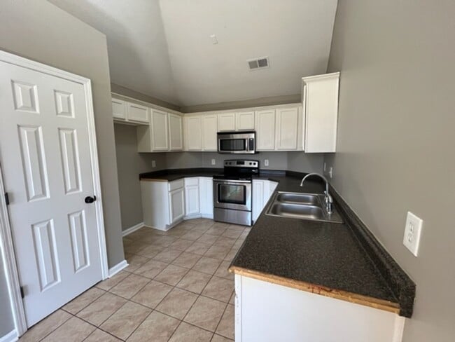 Building Photo - Renovated 3 Bedroom 2 Bath Home with 2 Car...