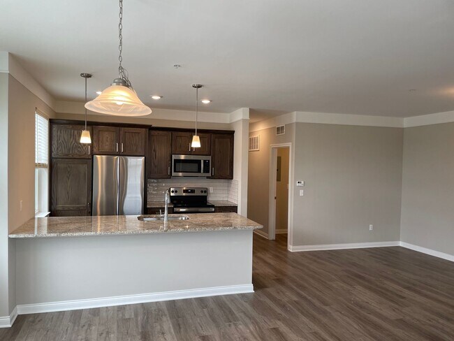 Building Photo - Shelby Township - 3 Bedroom, 2 Bath, End-Unit condo style w/Att Garage