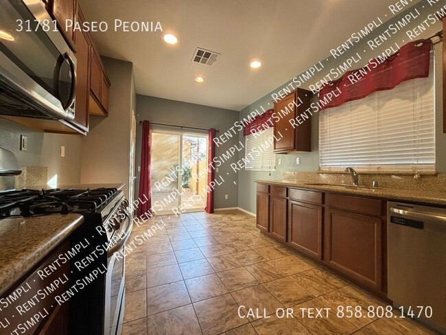 Building Photo - 2 BR 2.5 BA Condo located in The Paseos at...