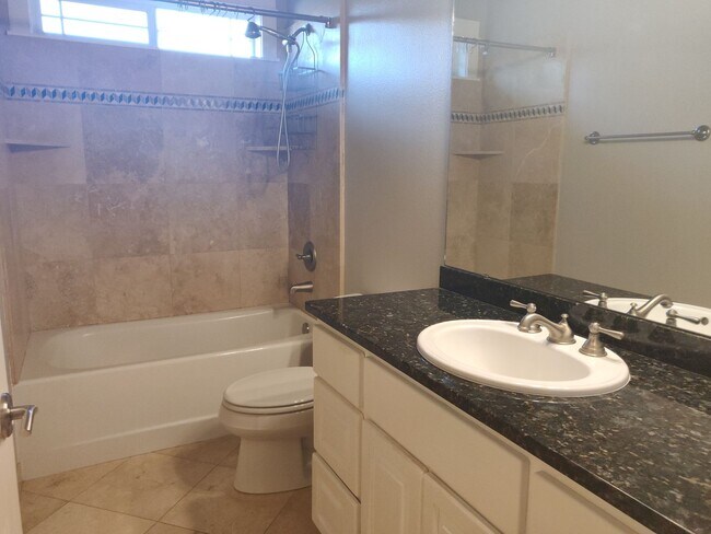 Building Photo - Stunning 4x2 with all bedrooms on the main...