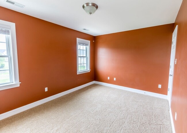Building Photo - Huge house with vaulted ceilings and fenced in rear yard