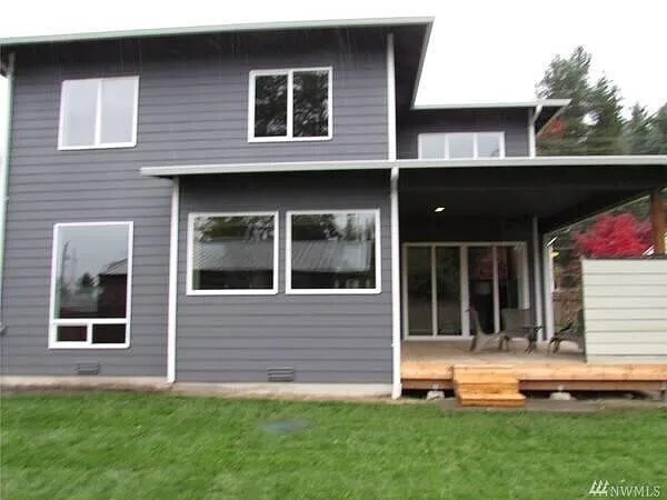 Back of house and large covered patio. - 15828 25th Ave NE