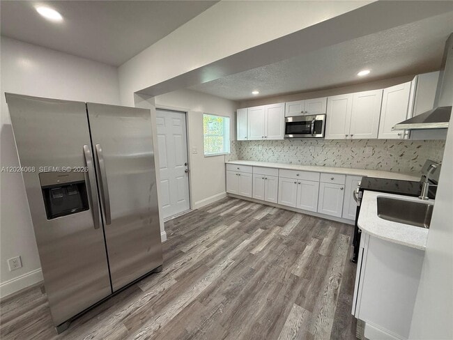 Building Photo - 2161 NW 26th Ave