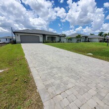 Building Photo - Coming Soon! 4 Bedroom 2 Bath Annual Rental in NW Cape!