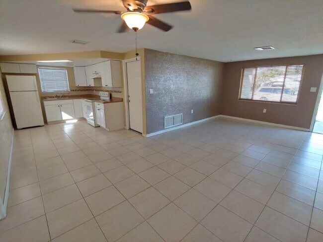 Building Photo - Gorgeous 3/2/1 1200 Sq. Ft. with fenced yard, all tile floors, custom baths and remodeled kitchen!!