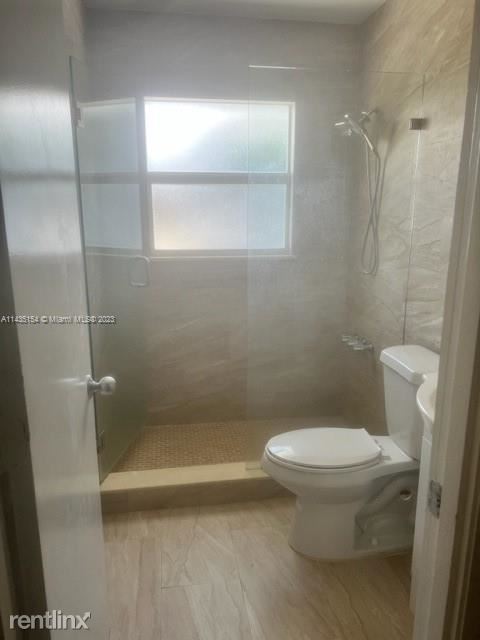 Building Photo - 3 br, 2 bath House - 1410 NE 56th Ct # 1412