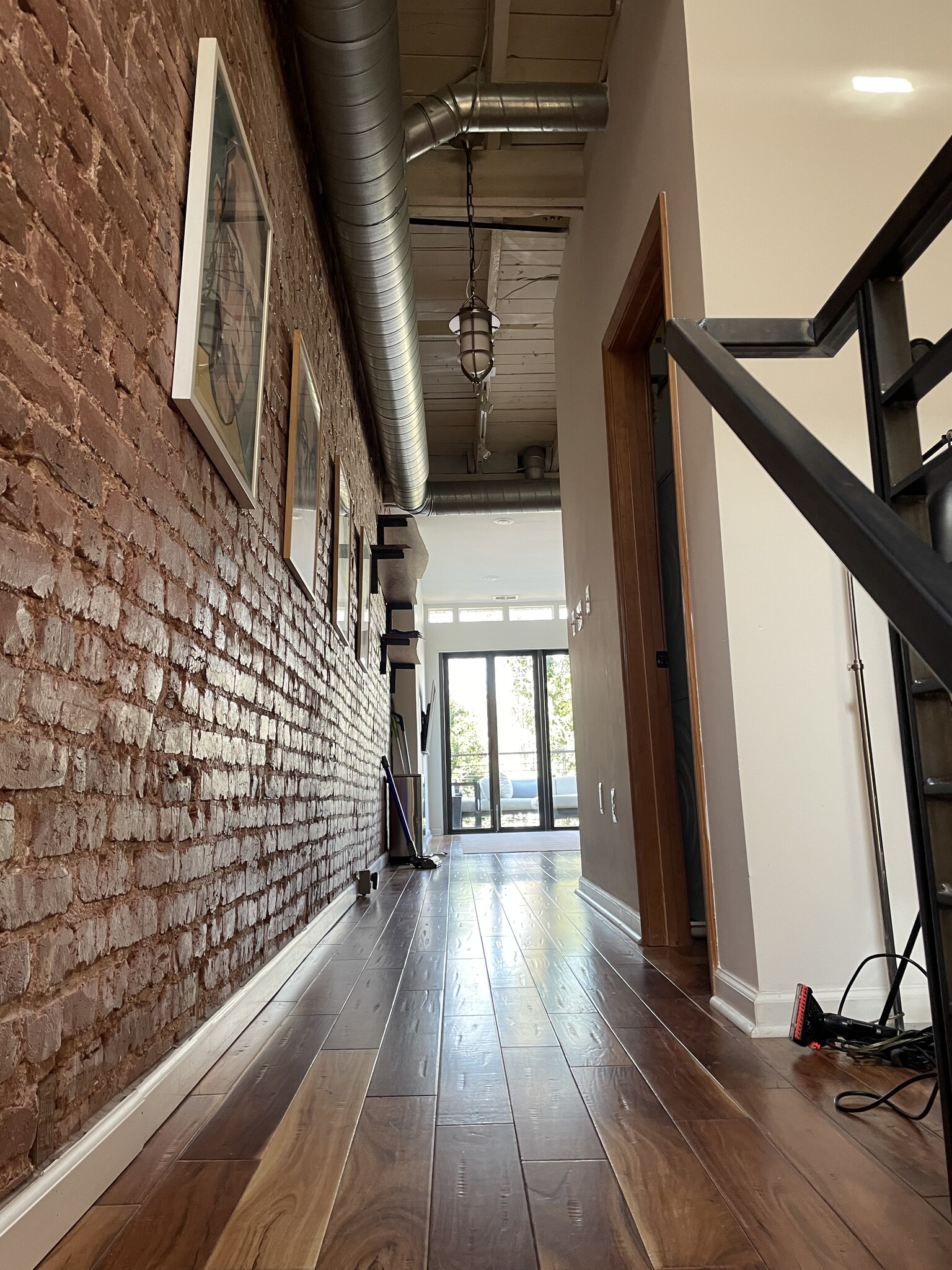 Acacia hardwood floors with custom iron railings - 1003 P St NW