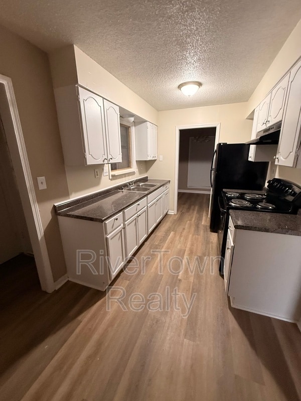 Building Photo - 4987 Scenicwood Cove