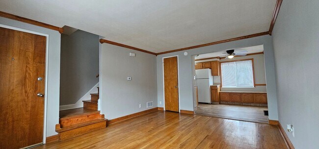 Building Photo - Beautiful 2BR/1BA Townhome with Attached Garage and W/D Hookups