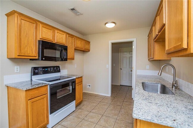 Building Photo - 6405 SW Meadow Well Ave