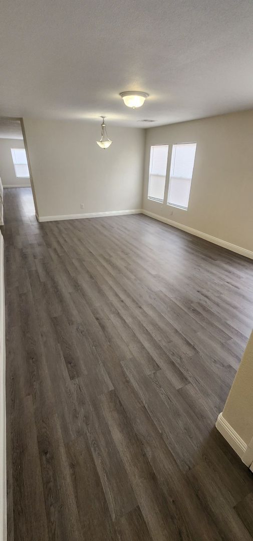 Building Photo - HOUSING CHOICE VOUCHER APPROVED! Spacious Henderson Home with Open Layout & Endless Backyard Pote...