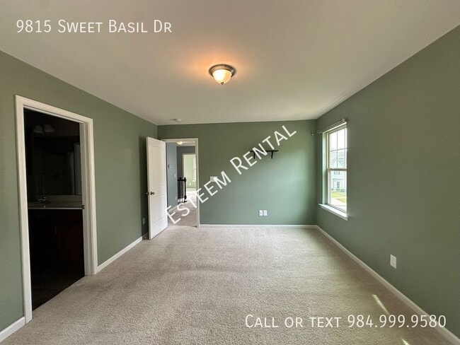 Building Photo - 9815 Sweet Basil Dr