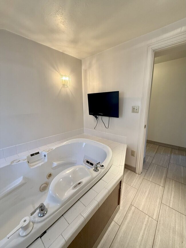 Building Photo - Timeless Charm, Modern Living — 4-Bed Gem ...