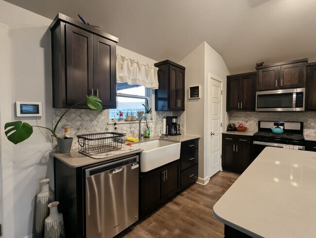 Building Photo - Modern Norman Home | Storm Shelter, Covered Patio, Community Pond & Park!