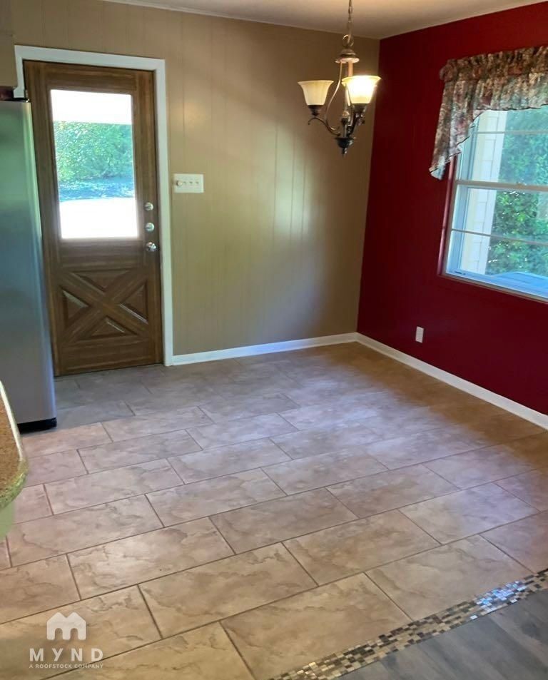 Building Photo - 7527 Quail Run Dr