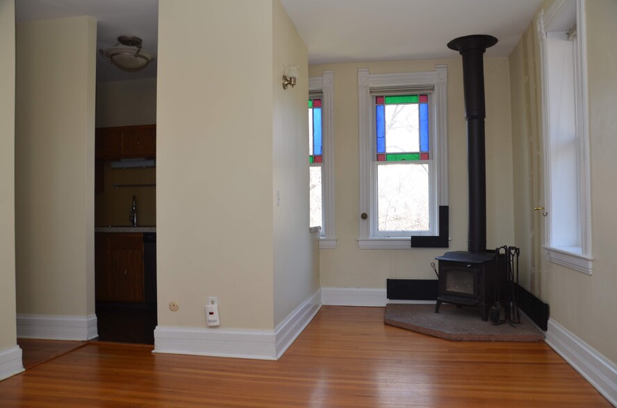 wood burning stove and stained glass window - 1709 Pine St