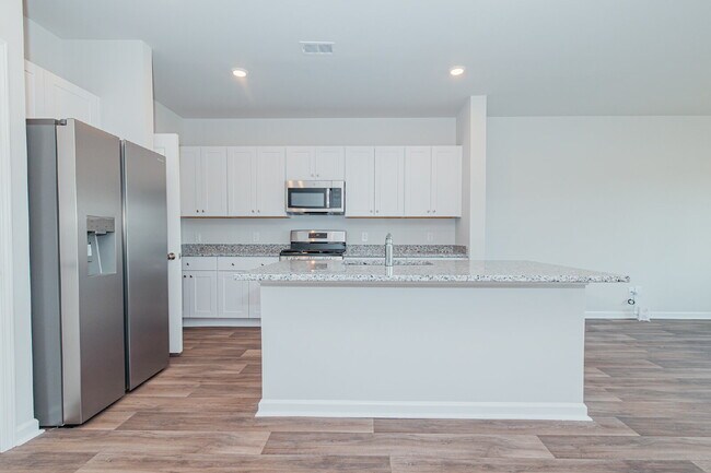 Building Photo - Brand-new 3 bedroom, 2.5 Bath Townhome with pond view