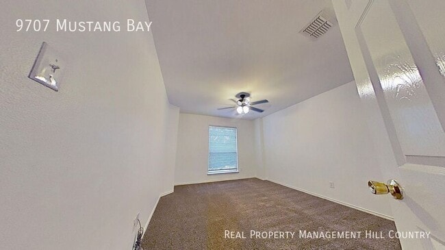 Building Photo - 9707 Mustang Bay