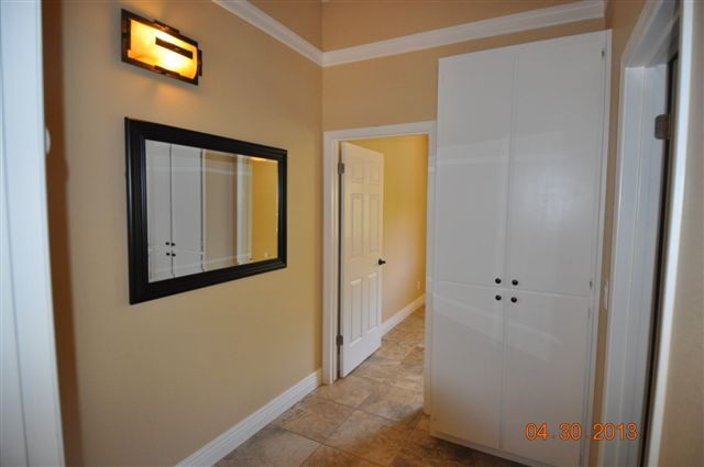 Upstairs hallway looking towards the Primary Bedroom and the Hallway cabinets - 13059 Lincoln Way
