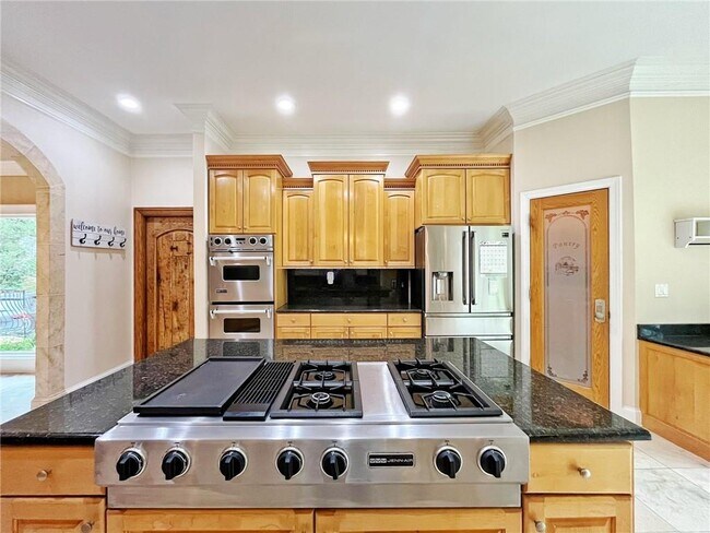 Building Photo - 6709 Wooded Cove Ct