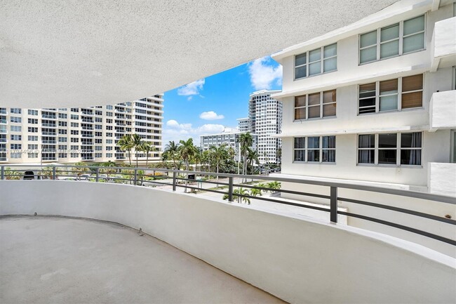 Building Photo - 5555 Collins Ave