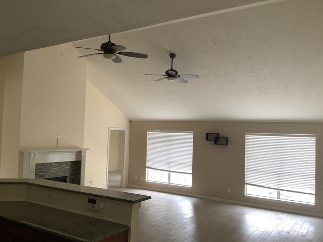 View of the great room. Vaulted ceilings. - 11502 Grimes Ave