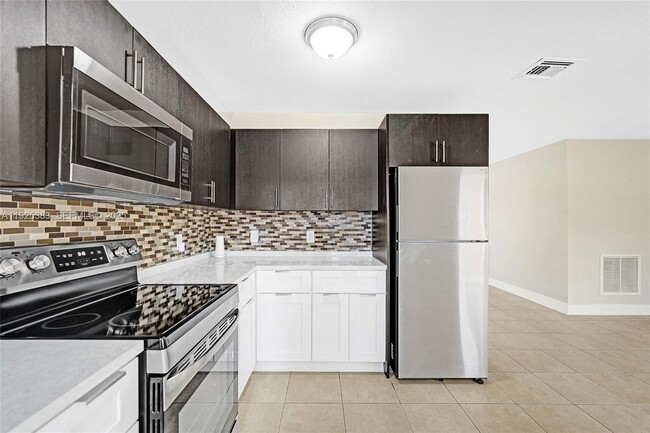 Building Photo - 1777 NW 34th Ave