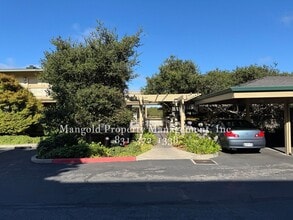Building Photo - Spacious 2-Bed, 2-Bath Condo with Fireplac...