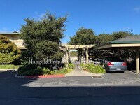 Building Photo - Spacious 2-Bed, 2-Bath Condo with Fireplac...