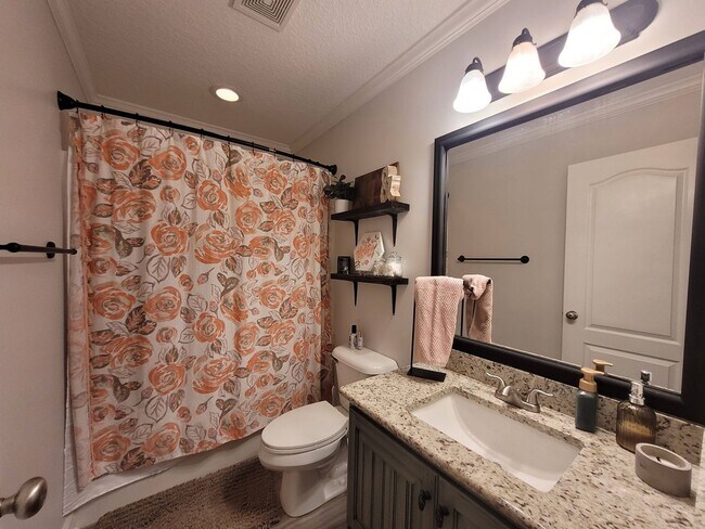 Building Photo - Exquisite Southern Living: 3BR/2BA Gem with Modern Touches, Fenced Yard, and Community Pool in Be...