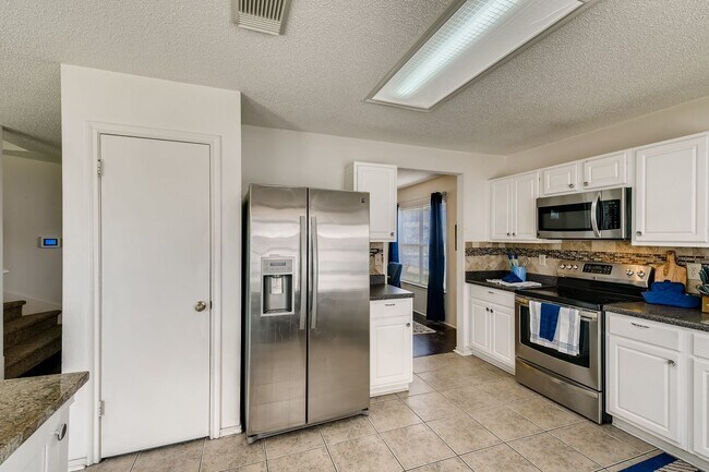 Building Photo - BEAUTIFUL HOME  |  OPEN CONCEPT  |  3 LIVING AREAS  |  FURNISHED OPTION  |  NEAR SCHOOLS & SHOPPING