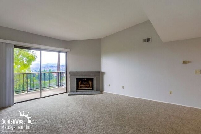 Building Photo - Breezy 2Bdm 2Ba Top-Floor Corner Condo with Mountain Views!