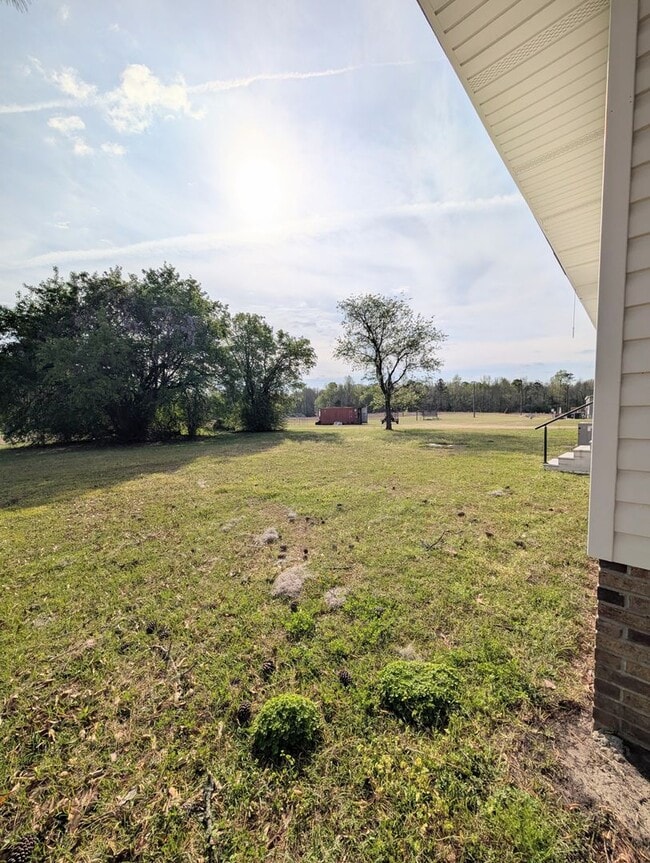 Building Photo - 6003 Sunrise Dr
