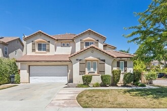 Building Photo - Paseo Del Sol, 5 br/3 ba House, 2-Story, 3 car gar, yard, corner lot, gardener, granite, hardwood...
