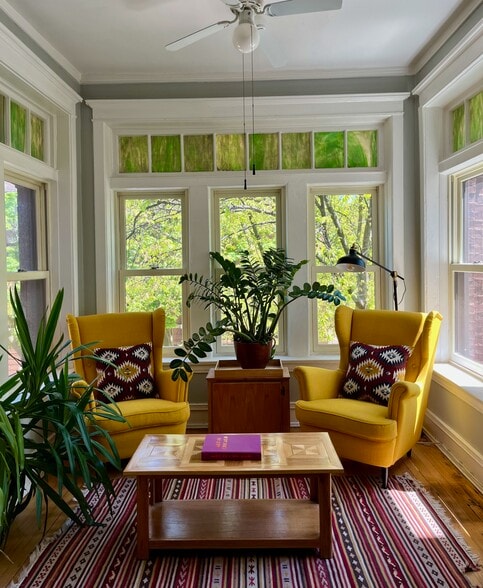 This east-facing sunroom is bright from sunrise until sunset. - 5142 S Greenwood Ave
