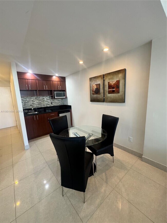 Building Photo - 19370 Collins Ave