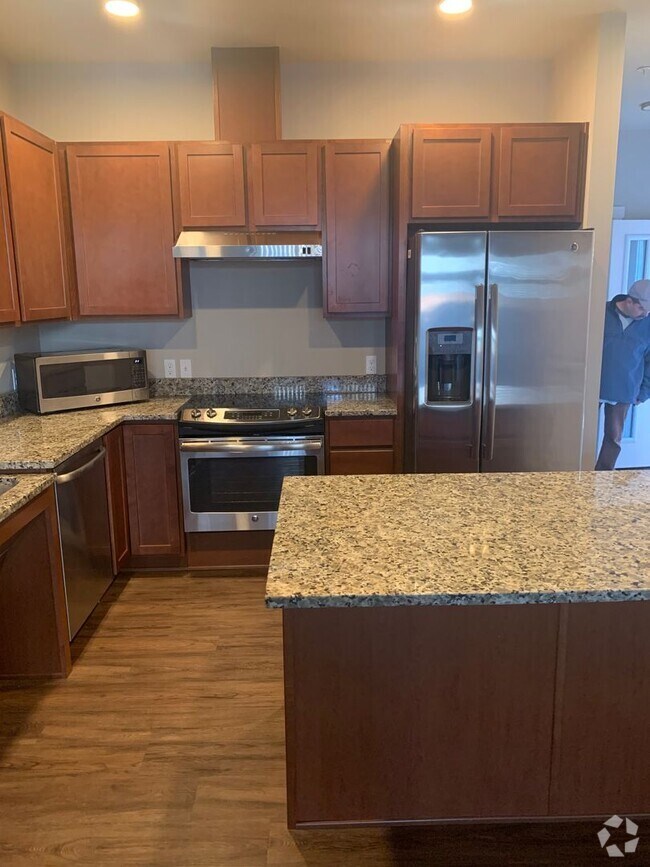Building Photo - You’ll Love the Floor Plans. Find your new...