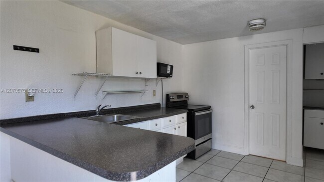 Building Photo - 9815 SW 51st Terrace