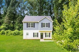 Building Photo - 604 E Texas Ave