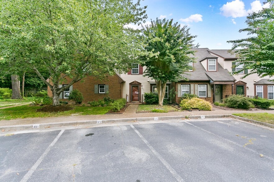 Front Exterior with 2 marked parking spots - 117 Wellesley Dr