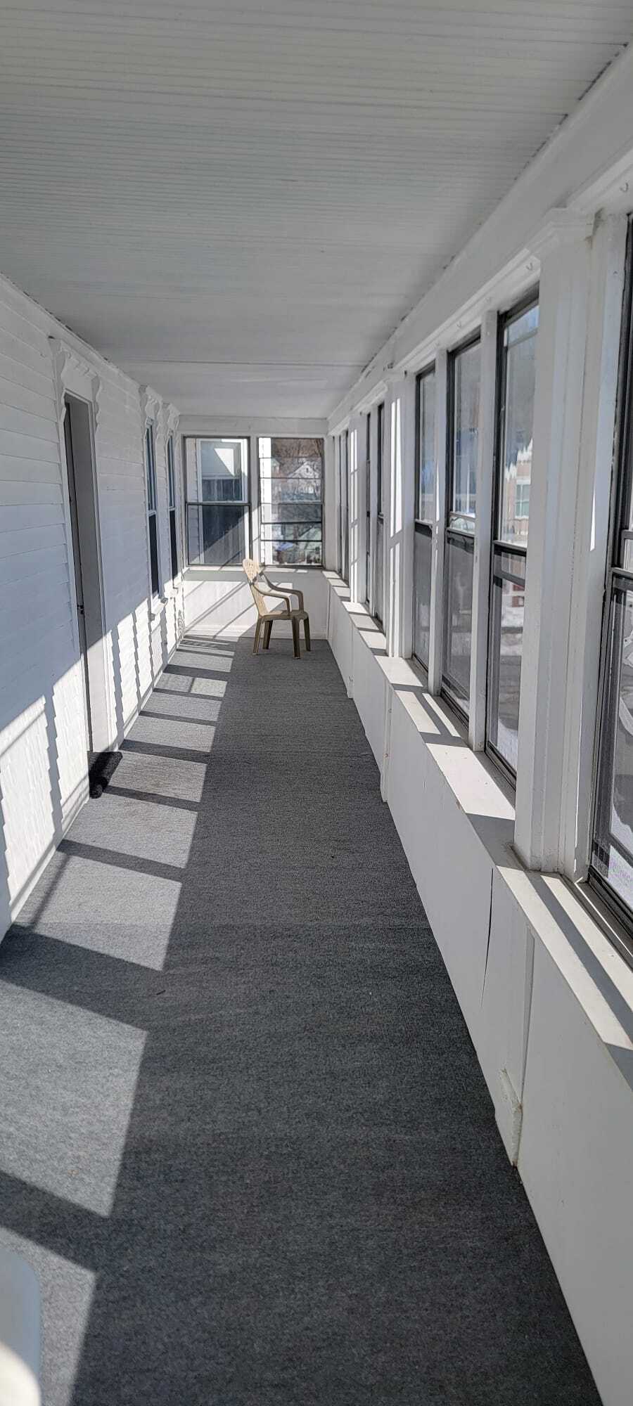 Enclosed second floor porch - 80 Linden St