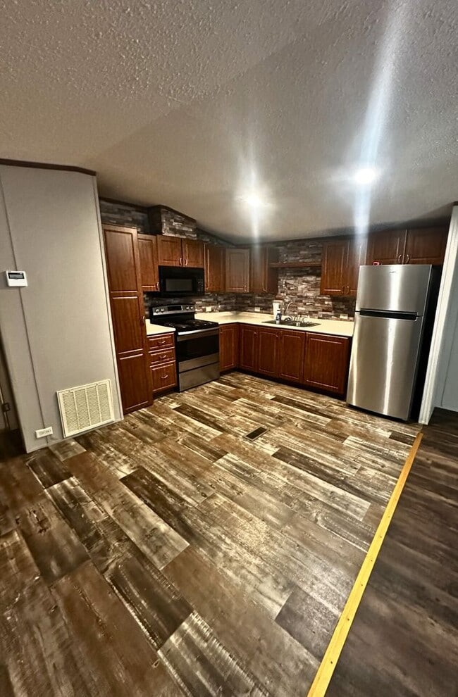 Building Photo - Secure Gated Delight Community