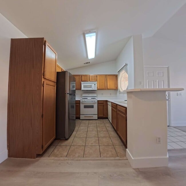 Building Photo - Upgraded 1 Bed 1 Bath Second-Story Condo at Opulence!