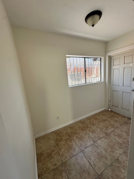 Small room great for office space or storage - 624 W 49th St