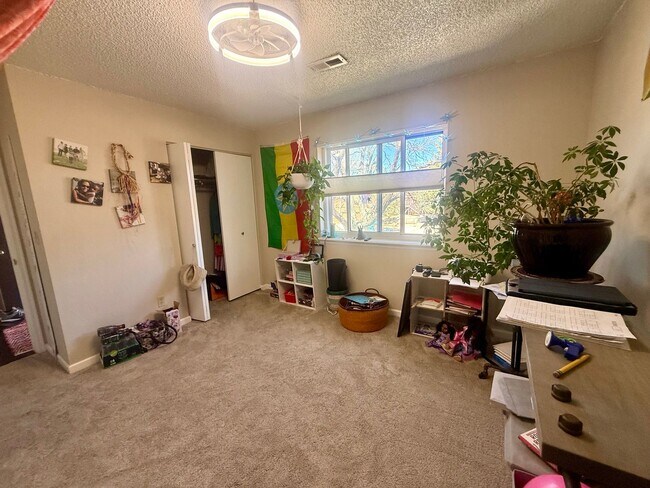 Building Photo - Spacious, Sunlit 3BR / 2 BA Condo just steps away from Standley Lake!