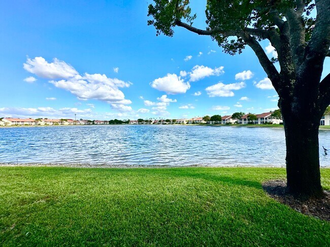 Building Photo - ** EMERALD LAKES ** 2 BED / 2 BATH CONDO - LAKE VIEW - CENTRAL NAPLES - ANNUAL RENTAL