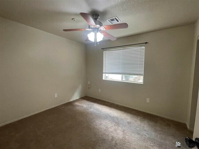 Building Photo - 9027 E 31st Ln